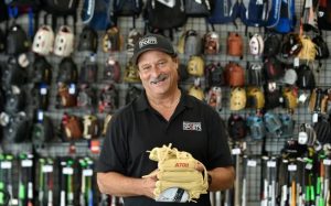 jared fields with a baseball glove inside of a store