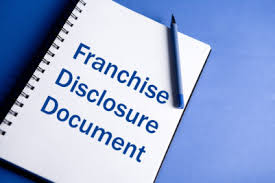 franchise disclosure document written in a notebook