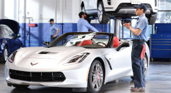 Aamco mechanic with corvette - Franchise Resales